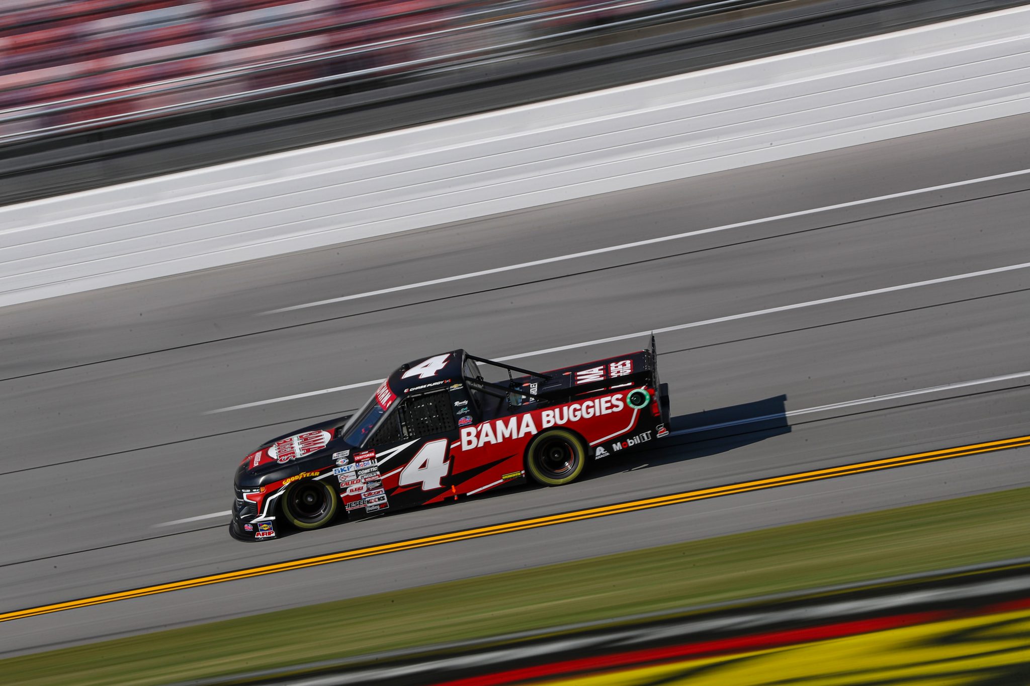 TALLADEGA, ALABAMA - SEPTEMBER 30: Chase Purdy, driver of the #4 Bama Buggies Chevrolet, drives during qualifying for the NASCAR Craftsman Truck Series Love's RV Stop 250 at Talladega Superspeedway on September 30, 2023 in Talladega, Alabama. (Photo by Meg Oliphant/Getty Images) | Getty Images
