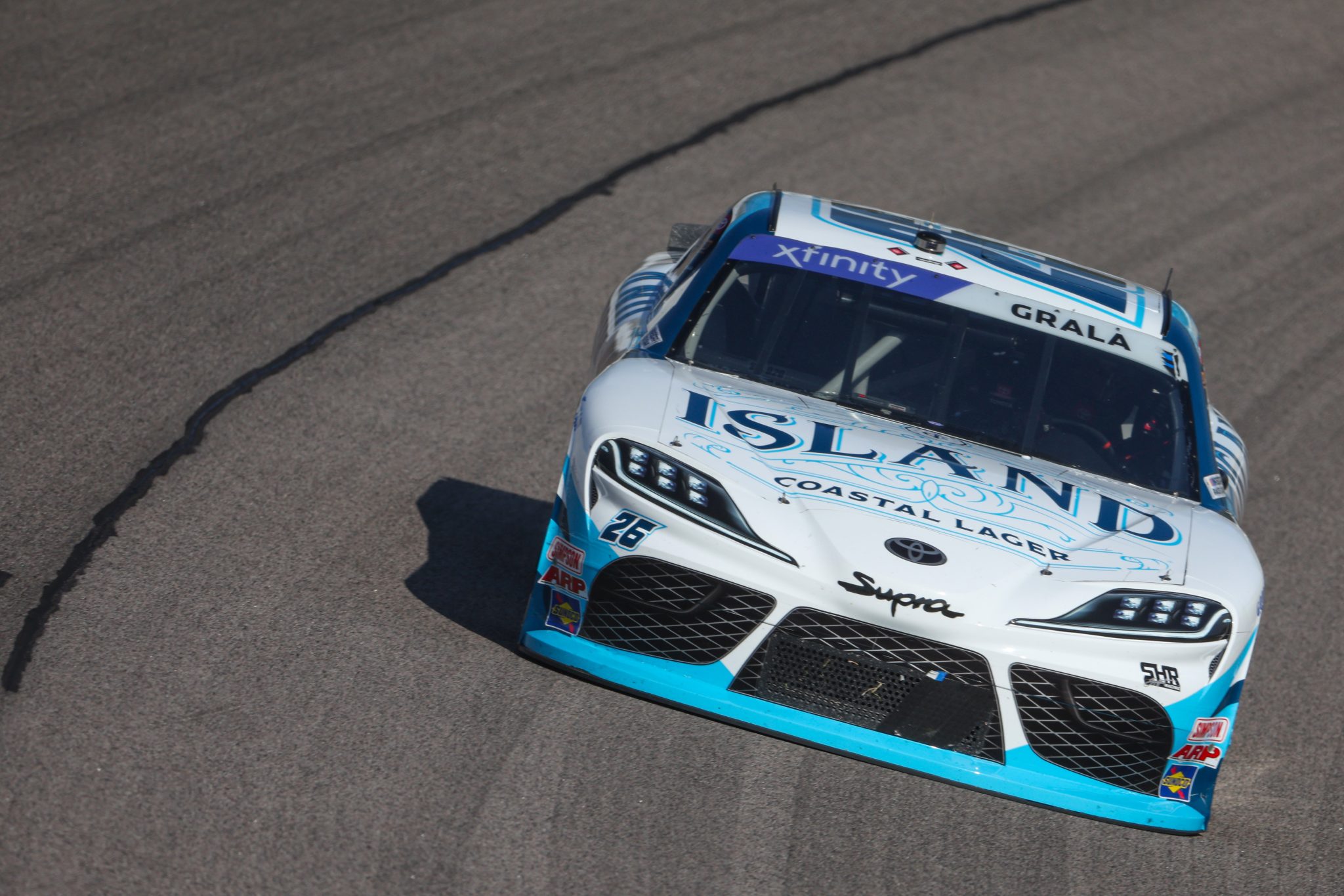 KANSAS CITY, KANSAS - SEPTEMBER 09: Kaz Grala, driver of the #26 Island Coastal Lager Toyota, drives during qualifying for the NASCAR Xfinity Series Kansas Lottery 300 at Kansas Speedway on September 09, 2023 in Kansas City, Kansas. (Photo by Jamie Squire/Getty Images) | Getty Images