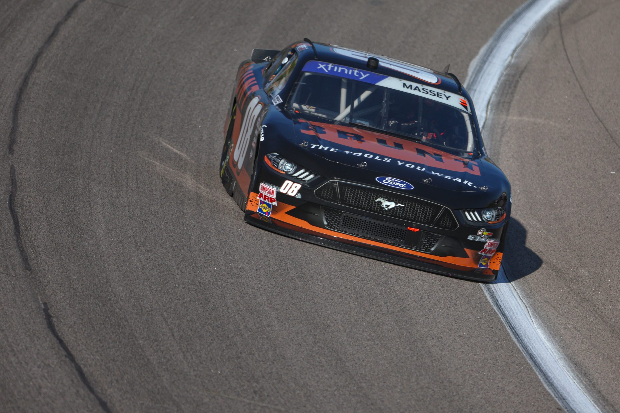 KANSAS CITY, KANSAS - SEPTEMBER 09: Mason Massey, driver of the #08 BRUNT Ford, drives during qualifying for the NASCAR Xfinity Series Kansas Lottery 300 at Kansas Speedway on September 09, 2023 in Kansas City, Kansas. (Photo by Jamie Squire/Getty Images) | Getty Images