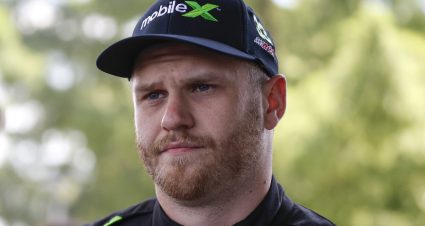 INDIANAPOLIS, INDIANA - AUGUST 13: Brodie Kostecki, driver of the #33 Mobile X Chevrolet, waits backstage during pre-race ceremonies prior to the NASCAR Cup Series Verizon 200 at the Brickyard at Indianapolis Motor Speedway on August 13, 2023 in Indianapolis, Indiana. (Photo by Sean Gardner/Getty Images) | Getty Images