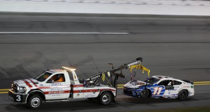 DAYTONA BEACH, FLORIDA - AUGUST 24: The #11 FedEx Cares Toyota, driven by Denny Hamlin is towed after an on-track incident during the NASCAR Cup Series Coke Zero Sugar 400 at Daytona International Speedway on August 24, 2024 in Daytona Beach, Florida. (Photo by James Gilbert/Getty Images) | Getty Images