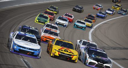 KANSAS CITY, KANSAS - SEPTEMBER 28: Austin Hill, driver of the #21 Bennett Transportation Chevrolet, Connor Zilisch, driver of the #88 KOA/RTIC Chevrolet, and Sheldon Creed, driver of the #18 Friends of Jaclyn Foundation Toyota, race during the NASCAR Xfinity Series Kansas Lottery 300 at Kansas Speedway on September 28, 2024 in Kansas City, Kansas. (Photo by Sean Gardner/Getty Images) | Getty Images