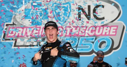CONCORD, NORTH CAROLINA - OCTOBER 12: Sam Mayer, driver of the #1 QPS Employment Group Chevrolet, celebrates in victory lane after winning the NASCAR Xfinity Drive for the Cure 250 presented by BCBS at Charlotte Motor Speedway on October 12, 2024 in Concord, North Carolina. (Photo by Meg Oliphant/Getty Images) | Getty Images
