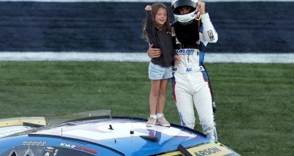 CONCORD, NORTH CAROLINA - OCTOBER 13: Kyle Larson, driver of the #5 HendrickCars.com Chevrolet, celebrates with his daughter, Audrey Larson after winning the NASCAR Cup Series Bank of America ROVAL 400 at Charlotte Motor Speedway on October 13, 2024 in Concord, North Carolina. (Photo by Meg Oliphant/Getty Images) | Getty Images