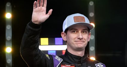 BRISTOL, TENNESSEE - SEPTEMBER 20: Logan Bearden, driver of the #15 Mullis Construction Group Ford, waves to fans as he walks onstage during driver intros prior to the NASCAR Xfinity Series Food City 300 at Bristol Motor Speedway on September 20, 2024 in Bristol, Tennessee. (Photo by James Gilbert/Getty Images) | Getty Images