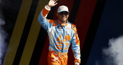 KANSAS CITY, KANSAS - SEPTEMBER 28: Brad Perez, driver of the #45 APEX Coffee Roasters Chevrolet, waves to fans as he walks onstage during driver intros prior to the NASCAR Xfinity Series Kansas Lottery 300 at Kansas Speedway on September 28, 2024 in Kansas City, Kansas. (Photo by Sean Gardner/Getty Images) | Getty Images