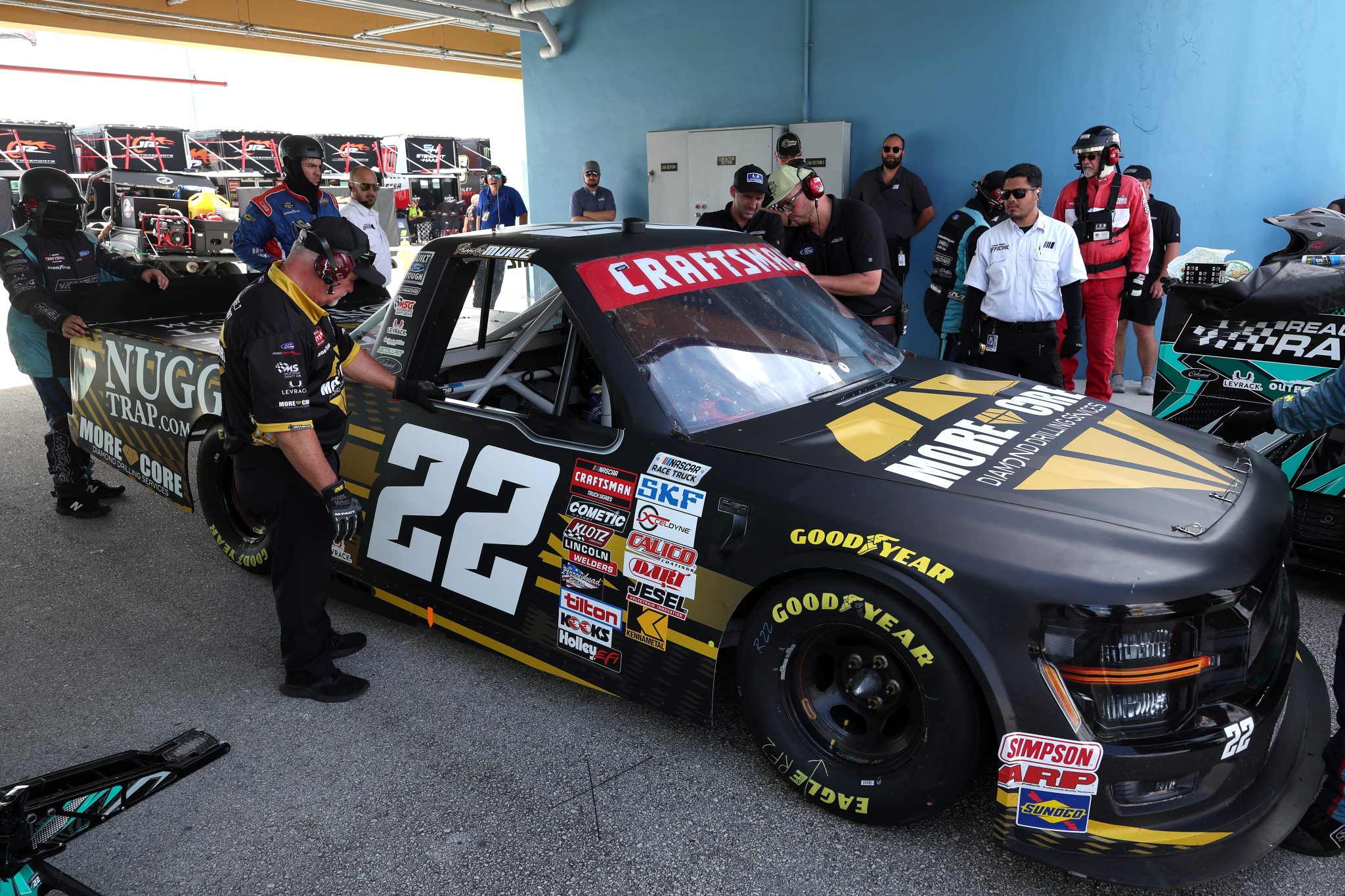 HOMESTEAD, FLORIDA - OCTOBER 26: Frankie Muniz, driver of the #22 More Core Ford, in the garage area for mechanical issue during the NASCAR Craftsman Truck Series Baptist Health 200 at Homestead-Miami Speedway on October 26, 2024 in Homestead, Florida. (Photo by James Gilbert/Getty Images) | Getty Images