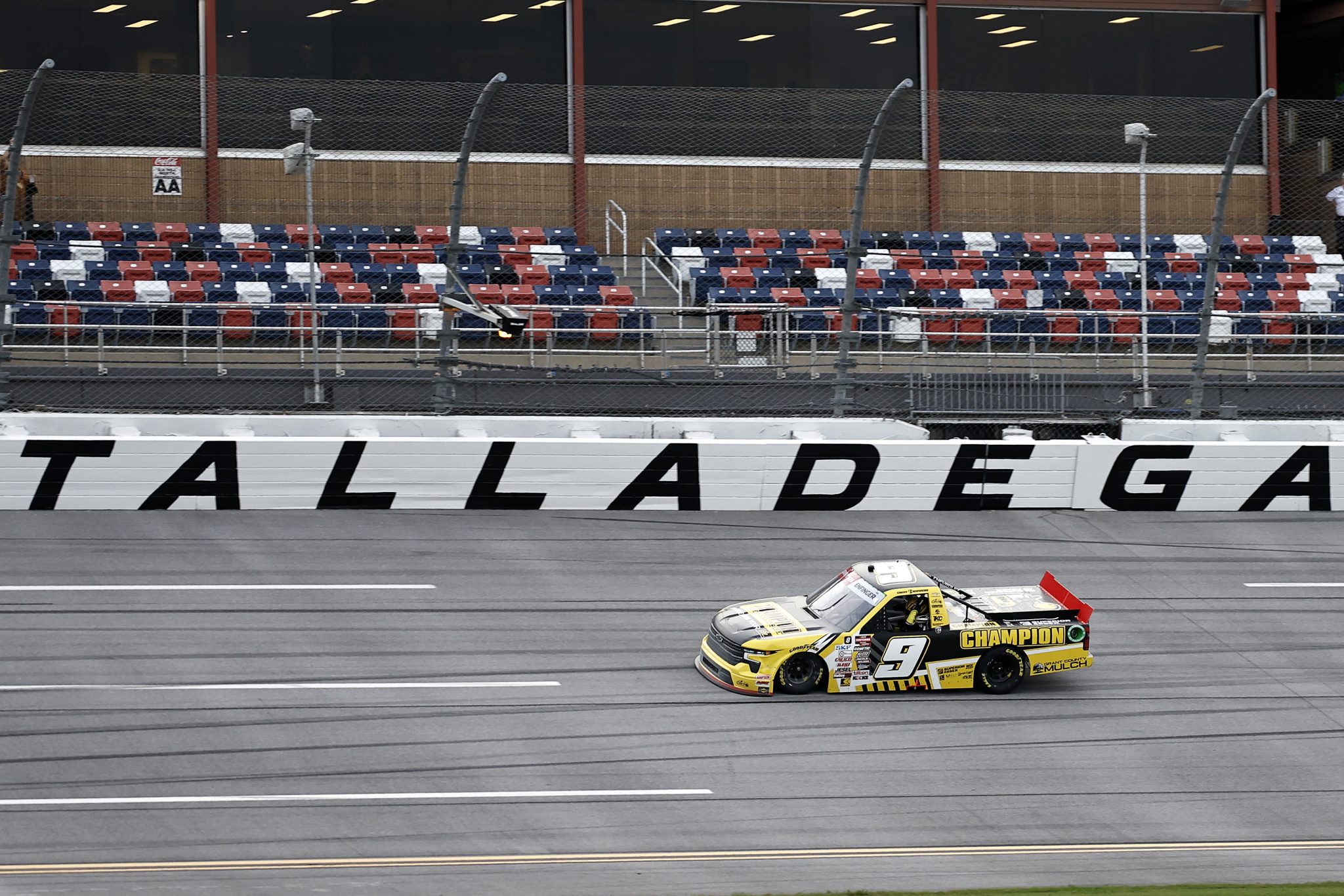 TALLADEGA, ALABAMA - OCTOBER 04: Grant Enfinger, driver of the #9 Champion Power Equipment Chevrolet, drives after winning the NASCAR Craftsman Truck Series Love's RV Stop 225 at Talladega Superspeedway on October 04, 2024 in Talladega, Alabama. (Photo by Chris Graythen/Getty Images) | Getty Images