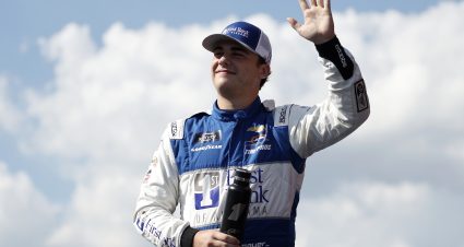 TALLADEGA, ALABAMA - OCTOBER 05: Sam Mayer, driver of the #1 First Bank of Alabama Chevrolet, waves to fans as he walks onstage during driver intros prior to  the NASCAR Xfinity Series United Rentals 250 at Talladega Superspeedway on October 05, 2024 in Talladega, Alabama. (Photo by Sean Gardner/Getty Images) | Getty Images