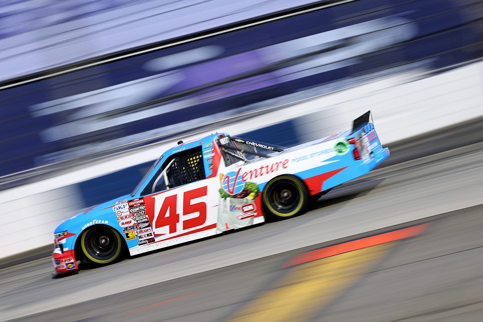 MARTINSVILLE, VIRGINIA - NOVEMBER 01: Kaden Honeycutt, driver of the #45 Moore's Venture Foods Chevrolet, drives during the NASCAR Craftsman Truck Series Zip Buy Now, Pay Later 200 at Martinsville Speedway on November 01, 2024 in Martinsville, Virginia. (Photo by David Jensen/Getty Images) | Getty Images