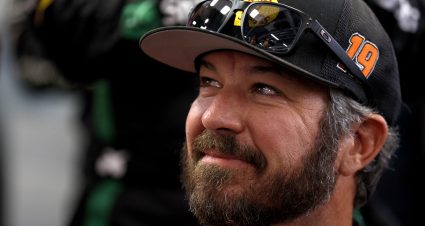 AVONDALE, ARIZONA - NOVEMBER 10: Retiring from full-time NASCAR competition Martin Truex Jr., driver of the #19 Bass Pro Shops Toyota, reacts to a standing ovation at the drivers meeting prior to the NASCAR Cup Series Championship Race at Phoenix Raceway on November 10, 2024 in Avondale, Arizona. (Photo by Sean Gardner/Getty Images) | Getty Images