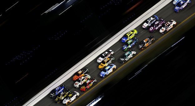 DAYTONA BEACH, FLORIDA - FEBRUARY 19: AJ Allmendinger, driver of the #16 Celsius Chevrolet, Tyler Reddick, driver of the #45 Nasty Beast Toyota, and Chris Buescher, driver of the #17 Fastenal Ford, race during the NASCAR Cup Series Daytona 500 at Daytona International Speedway on February 19, 2024 in Daytona Beach, Florida. (Photo by Mike Ehrmann/Getty Images) | Getty Images