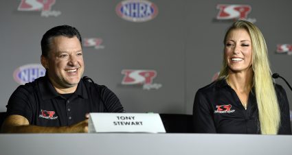 CONCORD, NORTH CAROLINA - OCTOBER 14: Tony Stewart speaks as Leah Pruett looks on during the press conference held at the zMAX Dragway on October 14, 2021 in Concord, North Carolina. (Photo by Mike Comer/Getty Images) | Getty Images