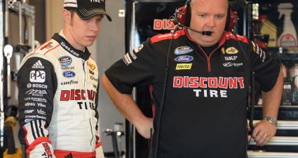 SPARTA, KY - JUNE 28:  Brad Keselowski, driver of the #22 Discount Tire Ford, talks to ihs crew chief Jeremy Bullins during practice for the NASCAR Nationwide Series Feed The Children 300 at Kentucky Speedway on June 28, 2013 in Sparta, Kentucky.  (Photo by John Harrelson/NASCAR via Getty Images)