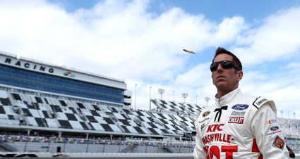 DAYTONA BEACH, FL - FEBRUARY 14:  Greg Biffle, driver of the #16 KFC Nashville Hot Ford, walks on the grid during qualifying for the NASCAR Sprint Cup Series Daytona 500 at Daytona International Speedway on February 14, 2016 in Daytona Beach, Florida.  (Photo by Patrick Smith/Getty Images) | Getty Images