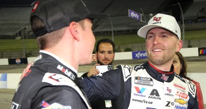 MARTINSVILLE, VIRGINIA - NOVEMBER 03: William Byron, driver of the #24 Liberty University Chevrolet, (R) speaks to Christopher Bell, driver of the #20 Mobil 1 Toyota, after Bell was penalized for a safety violation moving Byron to the Championship 4 after the NASCAR Cup Series Xfinity 500 at Martinsville Speedway on November 03, 2024 in Martinsville, Virginia. (Photo by Jonathan Bachman/Getty Images) | Getty Images