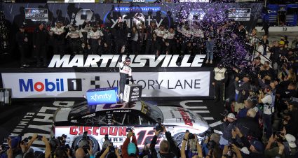 MARTINSVILLE, VIRGINIA - NOVEMBER 03: Ryan Blaney, driver of the #12 Discount Tire Ford, poses with the winner sticker on his car in victory lane after winning the NASCAR Cup Series Xfinity 500 at Martinsville Speedway on November 03, 2024 in Martinsville, Virginia. (Photo by Jonathan Bachman/Getty Images) | Getty Images