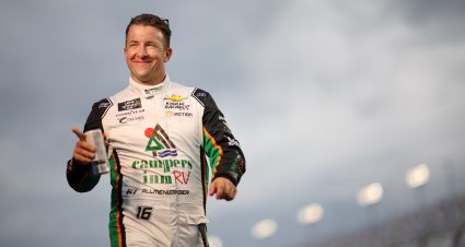 DAYTONA BEACH, FLORIDA - AUGUST 23: AJ Allmendinger, driver of the #16 Campers Inn RV Chevrolet, walks onstage during driver intros prior to  the NASCAR Xfinity Series Wawa 250 Powered by Coca-Cola at Daytona International Speedway on August 23, 2024 in Daytona Beach, Florida. (Photo by James Gilbert/Getty Images) | Getty Images