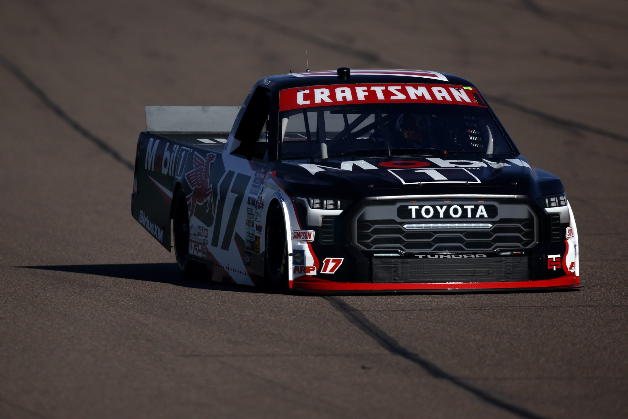 AVONDALE, ARIZONA - NOVEMBER 08: Taylor Gray, driver of the #17 Mobil 1 Toyota, drives during qualifying for the NASCAR Craftsman Truck Series Championship Race at Phoenix Raceway on November 08, 2024 in Avondale, Arizona. (Photo by Sean Gardner/Getty Images) | Getty Images