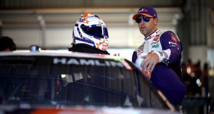 AVONDALE, ARIZONA - NOVEMBER 08: Denny Hamlin, driver of the #11 FedEx Toyota, enters his car in the garage area during practice for the NASCAR Cup Series Championship Race at Phoenix Raceway on November 08, 2024 in Avondale, Arizona. (Photo by James Gilbert/Getty Images) | Getty Images