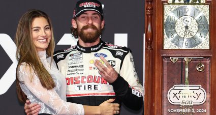 MARTINSVILLE, VIRGINIA - NOVEMBER 03: Ryan Blaney, driver of the #12 Discount Tire Ford, celebrates with Gianna Tulio in victory lane after winning the NASCAR Cup Series Xfinity 500 at Martinsville Speedway on November 03, 2024 in Martinsville, Virginia. (Photo by David Jensen/Getty Images) | Getty Images