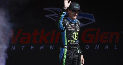 WATKINS GLEN, NEW YORK - SEPTEMBER 14: Parker Retzlaff, driver of the #31 FUNKAWAY Chevrolet, waves to fans as he walks onstage during driver intros prior to  the NASCAR Xfinity Series Mission 200 at The Glen at Watkins Glen International on September 14, 2024 in Watkins Glen, New York. (Photo by Sean Gardner/Getty Images) | Getty Images