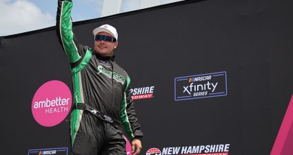 LOUDON, NEW HAMPSHIRE - JULY 15: Patrick Emerling, driver of the #35 Chevrolet, waves to fans as he walks onstage during driver intros prior to  the NASCAR Xfinity Series Ambetter Health 200 at New Hampshire Motor Speedway on July 15, 2023 in Loudon, New Hampshire. (Photo by Jonathan Bachman/Getty Images) | Getty Images