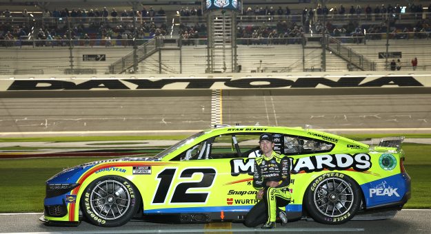 DAYTONA BEACH, FLORIDA - FEBRUARY 14: Ryan Blaney, driver of the #12 Menards/PEAK Ford, poses for a photo on the grid during qualifying for the NASCAR Cup Series Daytona 500 at Daytona International Speedway on February 14, 2024 in Daytona Beach, Florida. (Photo by Jared C. Tilton/Getty Images) | Getty Images