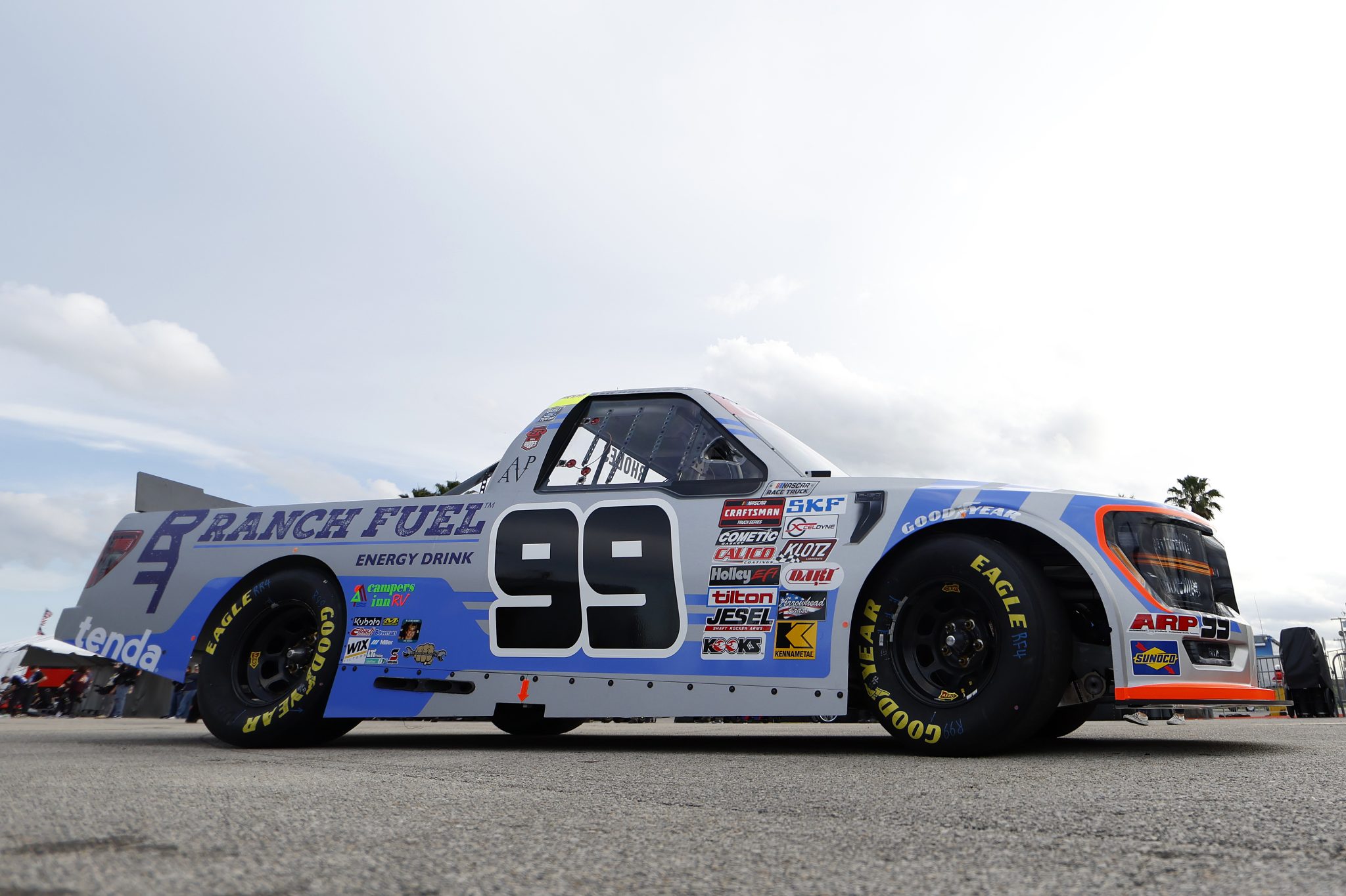 DAYTONA BEACH, FLORIDA - FEBRUARY 15: Ben Rhodes, driver of the #99 Ranch Fuel Energy Drink Ford, exits the garage area during practice for the NASCAR Craftsman Truck Series Fresh from Florida 250 at Daytona International Speedway on February 15, 2024 in Daytona Beach, Florida. (Photo by Mike Ehrmann/Getty Images) | Getty Images