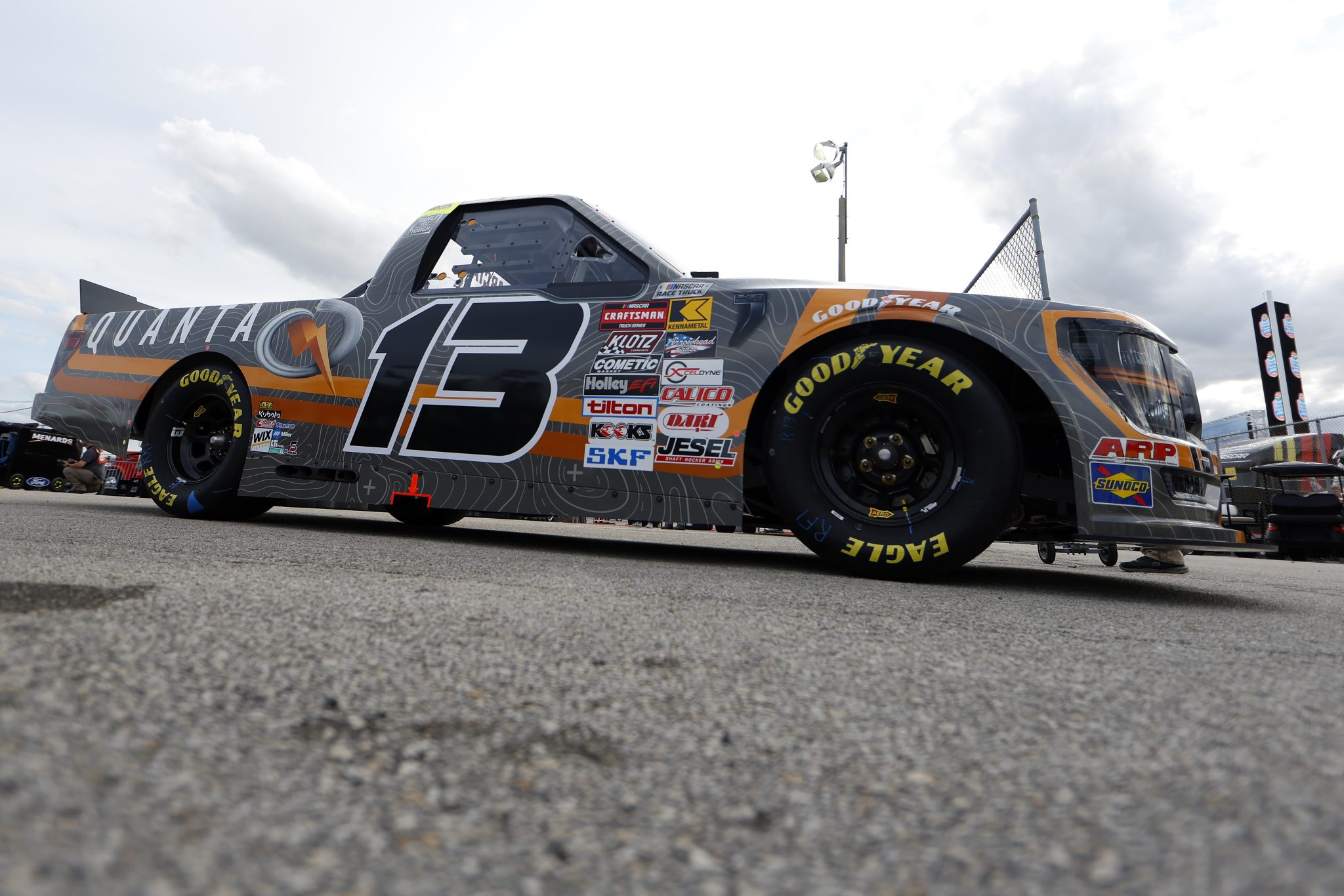 DAYTONA BEACH, FLORIDA - FEBRUARY 15: Jake Garcia, driver of the #13 Quanta Services Ford, exits the garage area during practice for the NASCAR Craftsman Truck Series Fresh from Florida 250 at Daytona International Speedway on February 15, 2024 in Daytona Beach, Florida. (Photo by Mike Ehrmann/Getty Images) | Getty Images