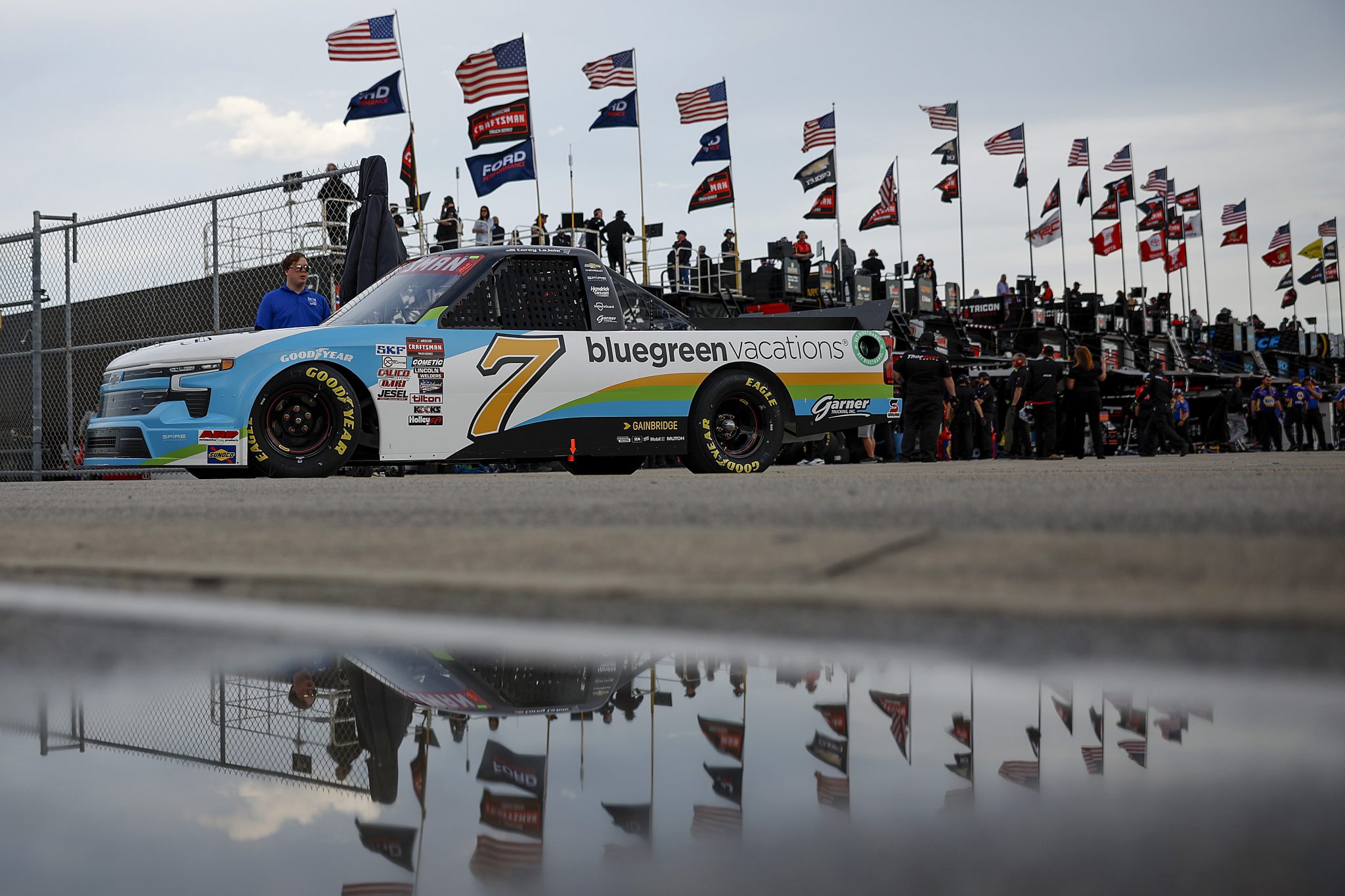 DAYTONA BEACH, FLORIDA - FEBRUARY 15: Corey LaJoie, driver of the #7 Bluegreen Vacations Chevrolet, exits the garage area during practice for the NASCAR Craftsman Truck Series Fresh from Florida 250 at Daytona International Speedway on February 15, 2024 in Daytona Beach, Florida. (Photo by James Gilbert/Getty Images) | Getty Images