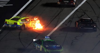 DAYTONA BEACH, FLORIDA - FEBRUARY 15: Ryan Blaney, driver of the #12 Menards/PEAK Ford, in flames after an on-track incident  with Chase Briscoe, driver of the #14 Mahindra Tractors Ford, BJ McLeod, driver of the #78 Live Fast Motorsports Chevrolet, and Kyle Busch, driver of the #8 Zone Chevrolet, during the NASCAR Cup Series Bluegreen Vacations Duel #2 at Daytona International Speedway on February 15, 2024 in Daytona Beach, Florida. (Photo by Jared C. Tilton/Getty Images) | Getty Images