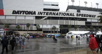 DAYTONA BEACH, FLORIDA - FEBRUARY 18: NASCAR fans are gathered outside of the Daytona International Speedway after the NASCAR Cup Series Daytona 500 was postponed due to weather on February 18, 2024 in Daytona Beach, Florida. (Photo by James Gilbert/Getty Images) | Getty Images