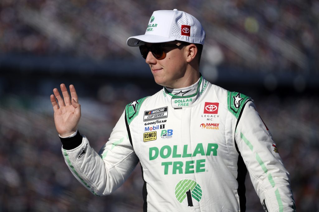 DAYTONA BEACH, FLORIDA - FEBRUARY 19: John H. Nemechek, driver of the #42 Dollar Tree Toyota, waves to fans as he walks onstage during driver intros prior to the NASCAR Cup Series Daytona 500 at Daytona International Speedway on February 19, 2024 in Daytona Beach, Florida. (Photo by Chris Graythen/Getty Images) | Getty Images