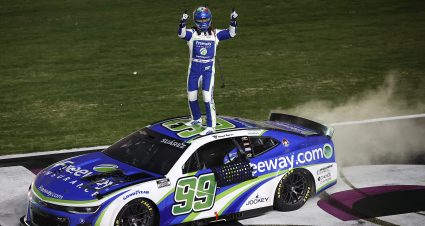 HAMPTON, GEORGIA - FEBRUARY 25: Daniel Suarez, driver of the #99 Freeway Insurance Chevrolet, celebrates after winning the NASCAR Cup Series Ambetter Health 400 at Atlanta Motor Speedway on February 25, 2024 in Hampton, Georgia. (Photo by Alex Slitz/Getty Images) | Getty Images
