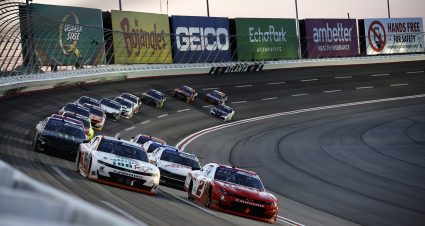 HAMPTON, GEORGIA - FEBRUARY 24: Jesse Love, driver of the #2 Whelen Chevrolet, and AJ Allmendinger, driver of the #16 Campers Inn RV Chevrolet, lead the field during the NASCAR Xfinity Series King of Tough 250 at Atlanta Motor Speedway on February 24, 2024 in Hampton, Georgia. (Photo by Alex Slitz/Getty Images) | Getty Images
