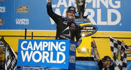 HOMESTEAD, FL - NOVEMBER 16:  Brett Moffitt, driver of the #16 AISIN Group Toyota, celebrates in victory lane with the trophy after winning the NASCAR Camping World Truck Series Ford EcoBoost 200 and the NASCAR Camping World Truck Series Championship at Homestead-Miami Speedway on November 16, 2018 in Homestead, Florida.  (Photo by Chris Graythen/Getty Images) | Getty Images