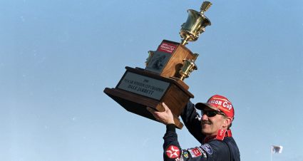 14 Nov 1999: Dale Jarrett poses with the winning trophy after winning the NASCAR Winston Cup Series during the Pennzoil 400, part of the NASCAR Winston Cup Series at the Homestead - Miami Speedway in Homestead, Florida. Mandatory Credit: Jon Ferrey  /Allsport