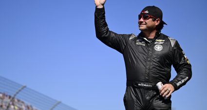 MARTINSVILLE, VIRGINIA - OCTOBER 29: BJ McLeod, driver of the #78 Falk'd Up Garage Chevrolet, waves to fans as he walks onstage during driver intros prior to the NASCAR Cup Series Xfinity 500 at Martinsville Speedway on October 29, 2023 in Martinsville, Virginia. (Photo by Logan Whitton/Getty Images) | Getty Images