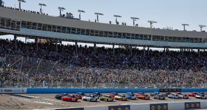 AVONDALE, ARIZONA - MARCH 10: Denny Hamlin, driver of the #11 Mavis Brakes Plus Toyota, and Ty Gibbs, driver of the #54 Monster Energy Toyota, lead the field to start the NASCAR Cup Series Shriners Children's 500 at Phoenix Raceway on March 10, 2024 in Avondale, Arizona. (Photo by Chris Graythen/Getty Images) | Getty Images