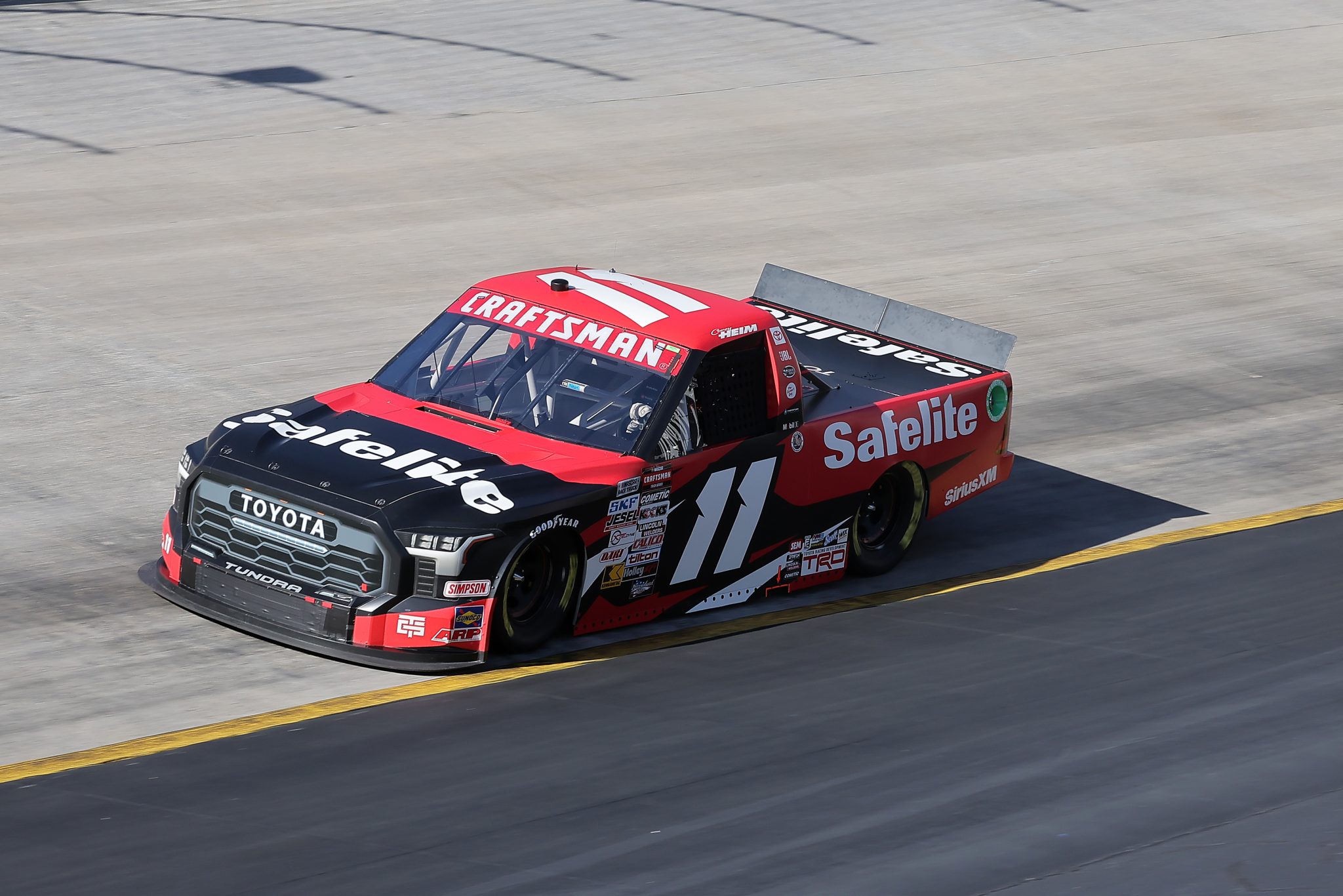 BRISTOL, TENNESSEE - MARCH 16: Corey Heim, driver of the #11 Safelite Toyota, drives during qualifying for the NASCAR Craftsman Truck Series Weather Guard Truck Race at Bristol Motor Speedway on March 16, 2024 in Bristol, Tennessee. (Photo by Jonathan Bachman/Getty Images) | Getty Images