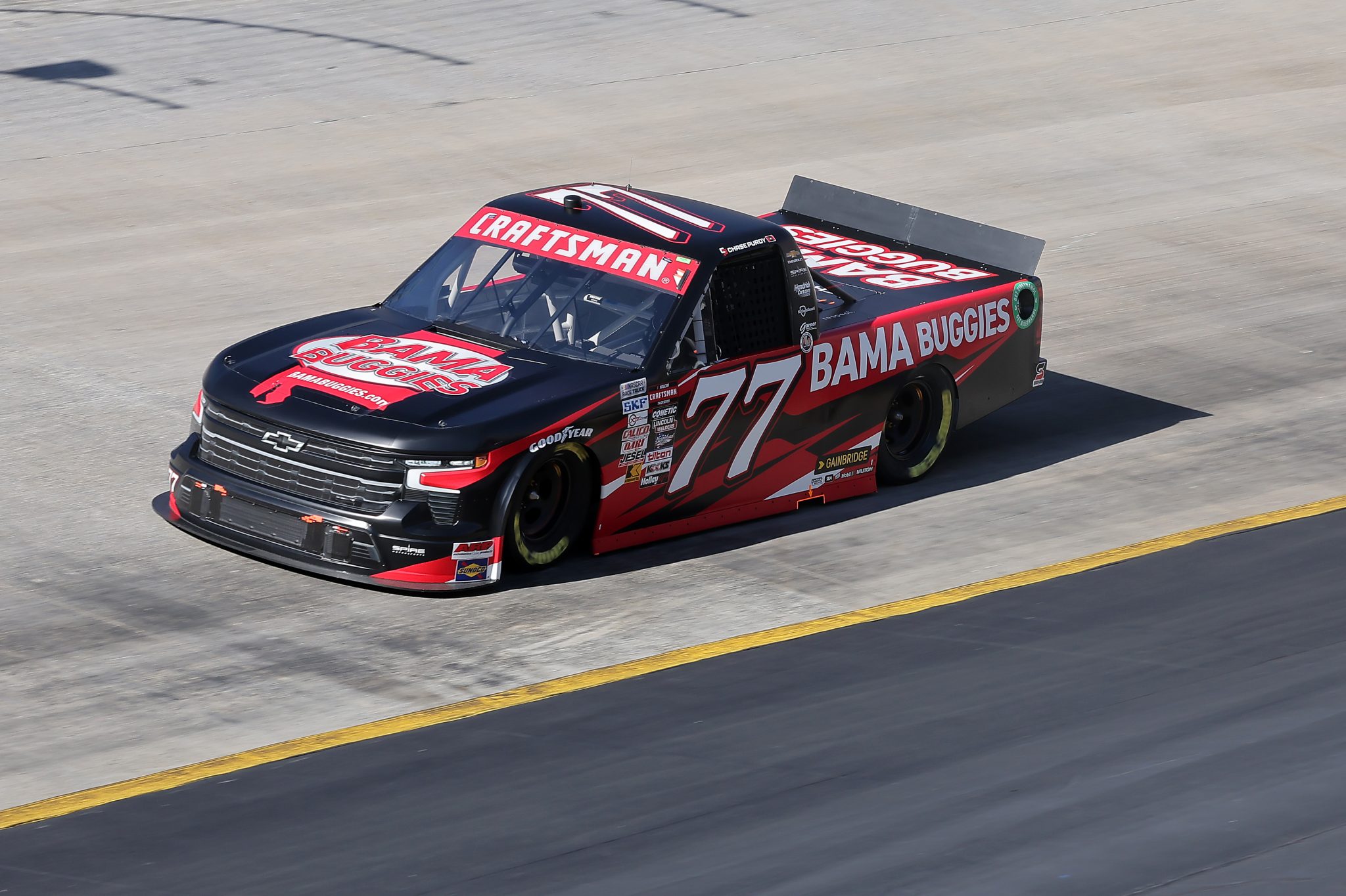 BRISTOL, TENNESSEE - MARCH 16: Chase Purdy, driver of the #77 Bama Buggies Chevrolet, drives during qualifying for the NASCAR Craftsman Truck Series Weather Guard Truck Race at Bristol Motor Speedway on March 16, 2024 in Bristol, Tennessee. (Photo by Jonathan Bachman/Getty Images) | Getty Images