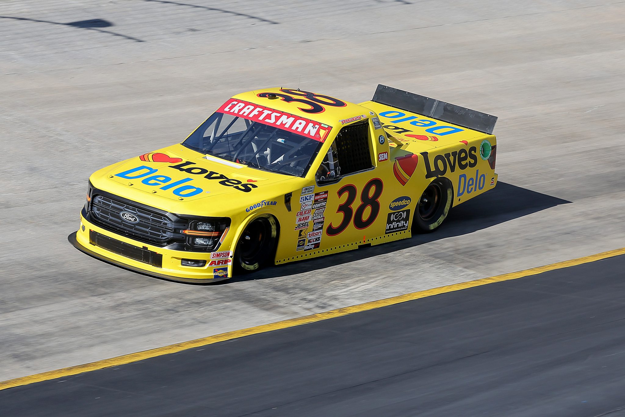 BRISTOL, TENNESSEE - MARCH 16: Layne Riggs, driver of the #38 Love's Travel Stops Ford, drives during qualifying for the NASCAR Craftsman Truck Series Weather Guard Truck Race at Bristol Motor Speedway on March 16, 2024 in Bristol, Tennessee. (Photo by Jonathan Bachman/Getty Images) | Getty Images