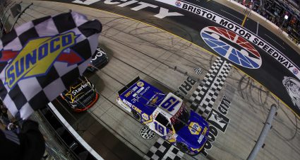 BRISTOL, TENNESSEE - MARCH 16: Christian Eckes, driver of the #19 NAPA Auto Care Chevrolet, takes the checkered flag to win the NASCAR Craftsman Truck Series Weather Guard Truck Race at Bristol Motor Speedway on March 16, 2024 in Bristol, Tennessee. (Photo by Meg Oliphant/Getty Images) | Getty Images