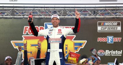 BRISTOL, TENNESSEE - MARCH 17: Denny Hamlin, driver of the #11 Express Oil Change Toyota, celebrates in victory lane after winning the NASCAR Cup Series Food City 500 at Bristol Motor Speedway on March 17, 2024 in Bristol, Tennessee. (Photo by Meg Oliphant/Getty Images) | Getty Images