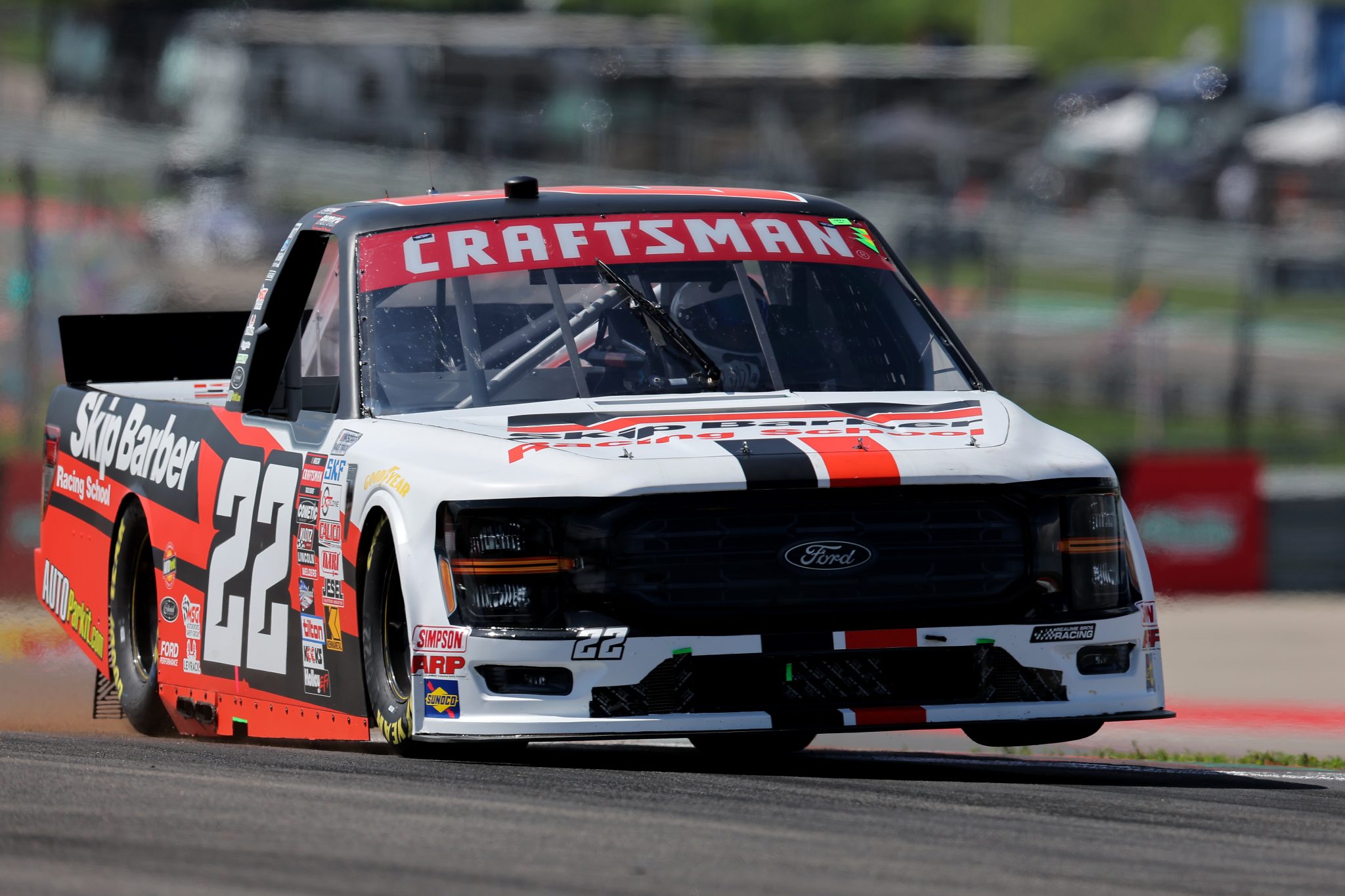 AUSTIN, TEXAS - MARCH 22: Carter Fartuch, driver of the #22 Skip Barber Racing School Ford, drives during practice for the NASCAR Craftsman Truck Series XPEL 225 at Circuit of The Americas on March 22, 2024 in Austin, Texas. (Photo by Jonathan Bachman/Getty Images) | Getty Images