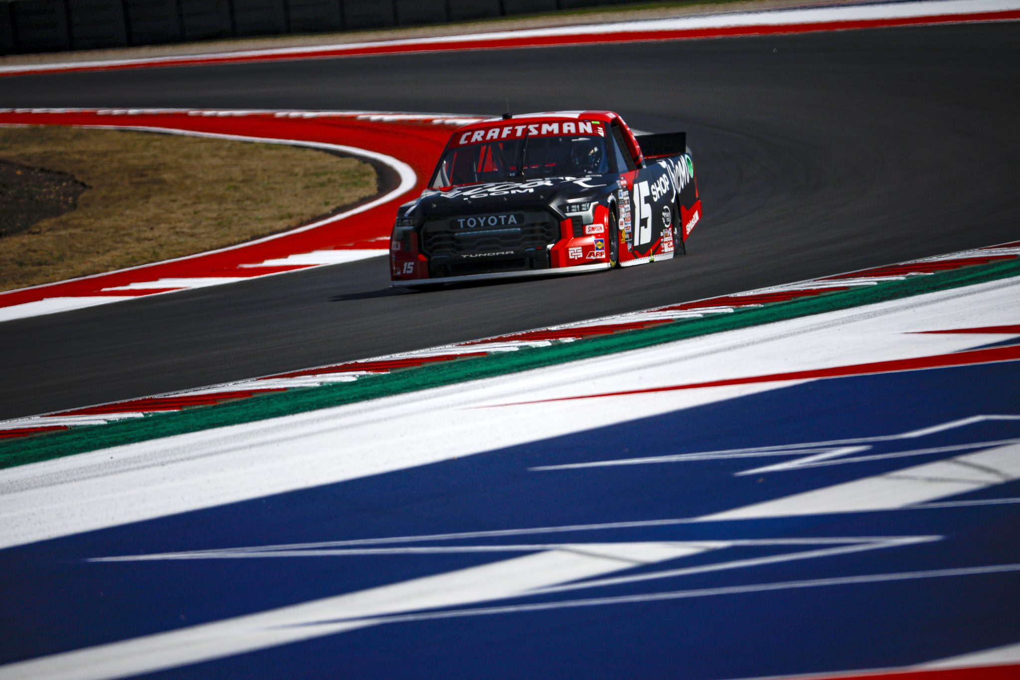 AUSTIN, TEXAS - MARCH 22: Tanner Gray, driver of the #15 ShopTRICON.com Toyota, drives during qualifying for the NASCAR Craftsman Truck Series XPEL 225 at Circuit of The Americas on March 22, 2024 in Austin, Texas. (Photo by Sean Gardner/Getty Images) | Getty Images