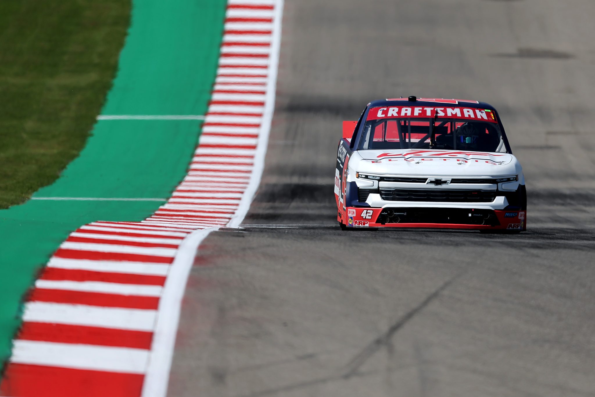 AUSTIN, TEXAS - MARCH 22: Matt Mills, driver of the #42 J.F. Electric/Utilitra Chevrolet, drives during practice for the NASCAR Craftsman Truck Series XPEL 225 at Circuit of The Americas on March 22, 2024 in Austin, Texas. (Photo by Jonathan Bachman/Getty Images) | Getty Images