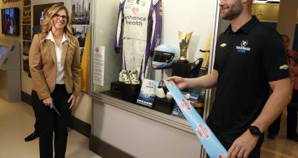 Shane van Gisbergen, Julie Giese and Winston Kelley Cut the Ribbon on New Exhibit to Recognize First-Ever NASCAR Cup Series Street Race Event in Chicago at the Nascar Hall of Fame  in Charlotte , NC. Andrew Coppley/Harrelson Photography Inc.
