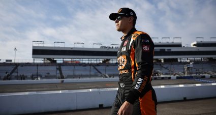 RICHMOND, VIRGINIA - MARCH 30: Corey Heim, driver of the #26 GearWrench Toyota, walks the grid during practice for the NASCAR Xfinity Series ToyotaCare 250 at Richmond Raceway on March 30, 2024 in Richmond, Virginia. (Photo by Alex Slitz/Getty Images) | Getty Images